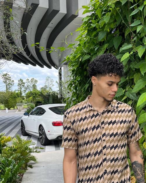 picture Ason Figueroa with a car